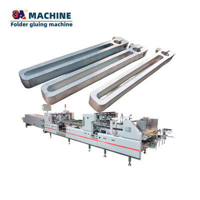 1.0 Automatische Schachtelklappmaschine Zubehör für das Einfügen von Schachteln und die Montage von Halterungen
